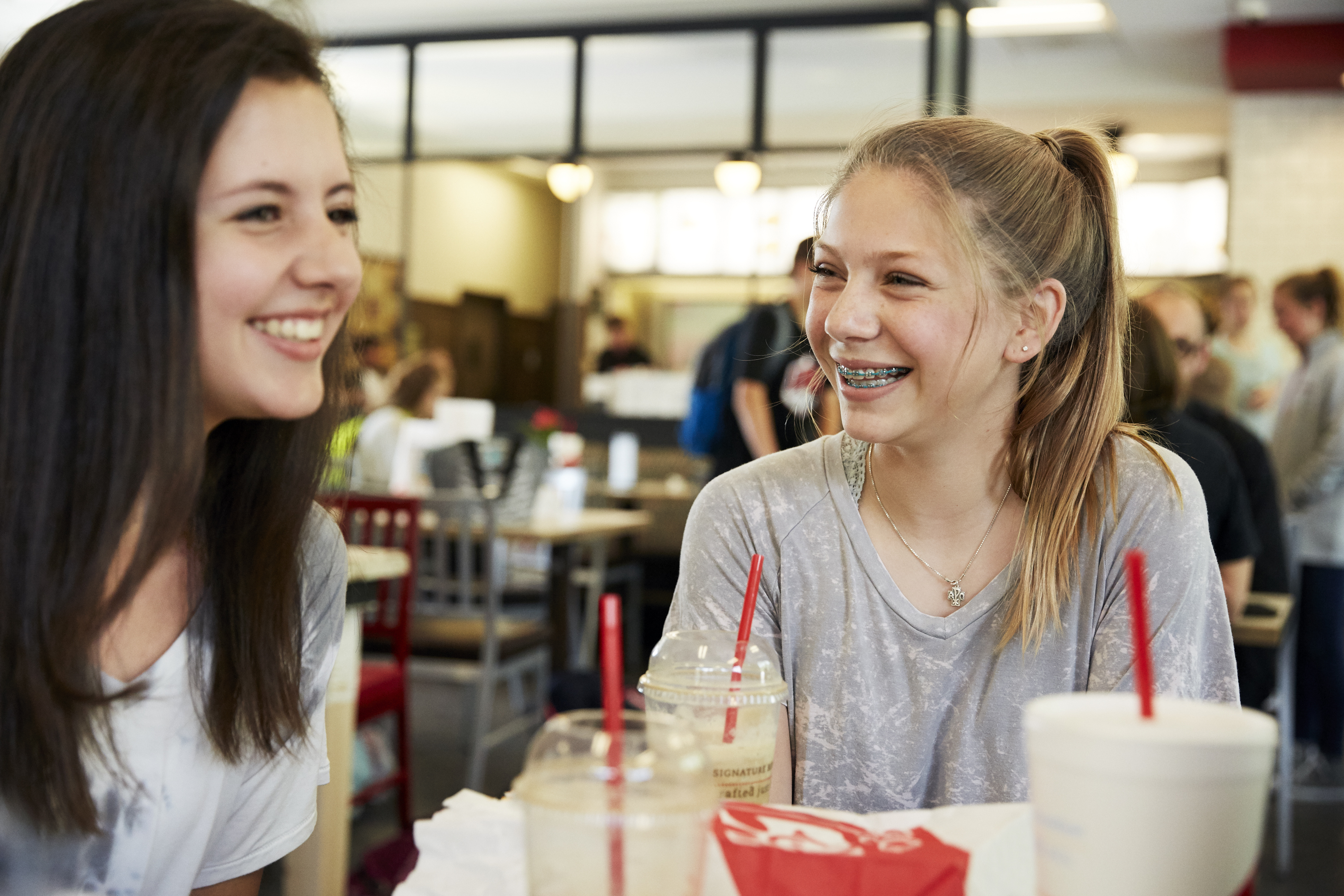 Teens eating Chick-fil-A